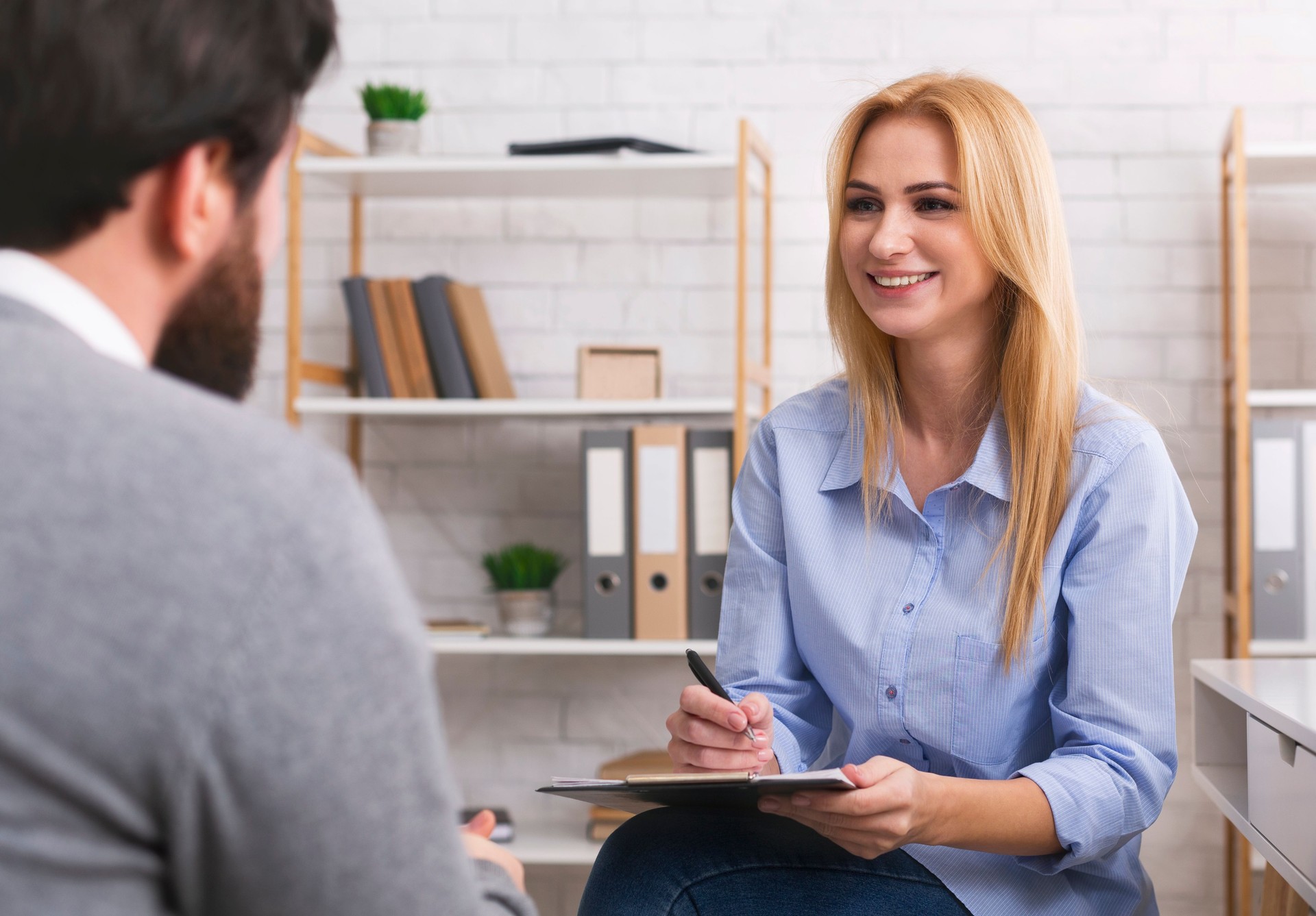 Psychologist having session with patient in office